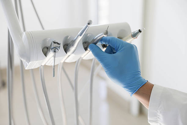 Professional Tooth Extraction technician working in Princeton, IN